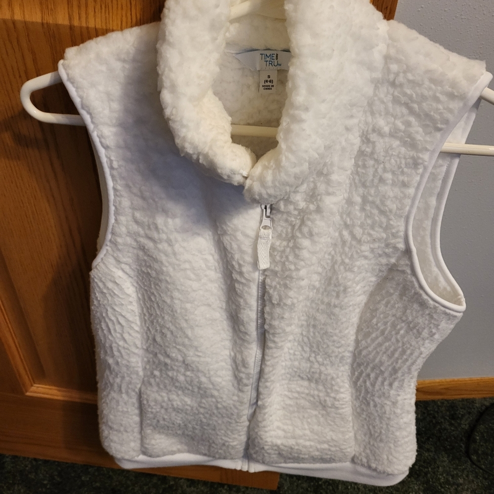 White fluffy vest